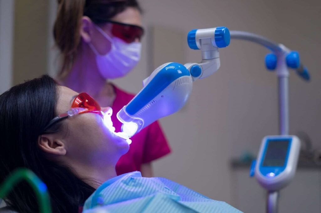 Laser Teeth Whitening steps in dental clinic